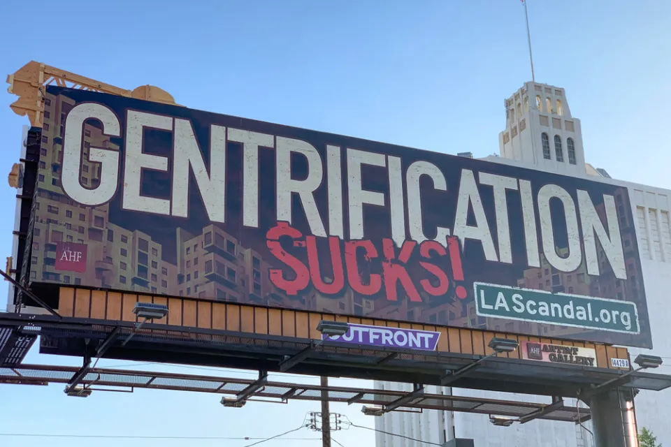 Billboard that says "Gentrification Sucks!" in Los Angeles, California